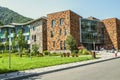 The main entrance and glazed academic buildings of the international school-College in Dilijan nature reserve