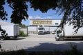 Truck and signage of Svetofor discounter grocery store with blue sky in background. Sunny daylight view.