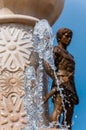 Golden warrior sculpture behind the stopped in time flowing fountain water streams as a part of the famous monument dedicated to Royalty Free Stock Photo