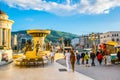 SKOPJE, MACEDONIA, MAY 14, 2016: People are passing over the ancient stone bridge in the macedonian capital skopje Royalty Free Stock Photo