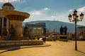 SKOPJE, NORTH MACEDONIA: Historical sculpture monument in woman shape and statue of Filip II.