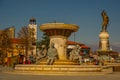 SKOPJE, NORTH MACEDONIA: Historical sculpture monument in woman shape and statue of Filip II.