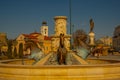 SKOPJE, NORTH MACEDONIA: Three horse fountainand statue of Filip II in the centre of Skopje city.