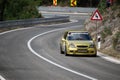 Skradin Croatia June 2020 Golden racing version of Citroen Saxo going at high speed on a hill climb championship