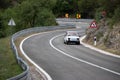 Skradin Croatia, June 2020 Simple white old Fiat 126 modified for hill climb racing up hill, going through a bend at high speed Royalty Free Stock Photo