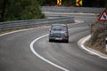 Skradin Croatia, June 2020 Simple white old Fiat 500 modified for hill climb racing up hill, going through a bend at high speed Royalty Free Stock Photo