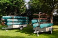 Skrunda, Latvia - July 25, 2017: Stacks of green canoes on two trailers