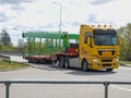 Skrunda, Latvia - May 13, 2022: Semi truck with empty car carrier trailer