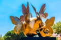 Skull golden monument with butterflies in Fontvielle, Monte-Carlo, Monaco, Cote d `Azur, French Riviera