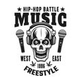 Skull in headphones vector hip-hop music emblem