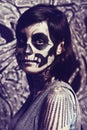 Skull, mask and portrait of woman on pattern for festival, Halloween and day of the dead. Creative makeup, costume and