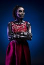 Skull personified woman with red dress Royalty Free Stock Photo