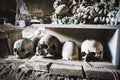 Skulls and bones in Fontanelle cemetery. Royalty Free Stock Photo