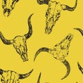 Skulls of bulls with horns, hand drawn ink doodle, sketch, seamless pattern design on yellow