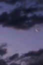 Sky background with gray clouds and crescent moon Royalty Free Stock Photo