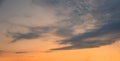 sky background with gray clouds and orange afterglow at sunset Royalty Free Stock Photo