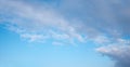 Sky background with grey clouds in the upper half and blue copy space Royalty Free Stock Photo