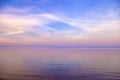 Sky background on sunset, colorful clouds. Nature abstract composition with reflections on sea water. Nature environment Royalty Free Stock Photo