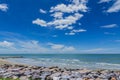 Sky with beautiful beach with rocks and tropical sea Royalty Free Stock Photo