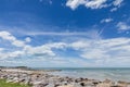 Sky with beautiful beach with rocks and tropical sea Royalty Free Stock Photo