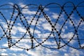 The sky behind the barbed wire Royalty Free Stock Photo