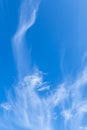 The sky is blue with clouds in beautiful, strangely patterned lines Royalty Free Stock Photo