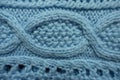 Sky blue knitted fabric with cable braids Royalty Free Stock Photo