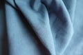 Sky-blue linen fabric in soft folds Royalty Free Stock Photo