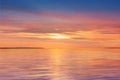 Sky blue  pink cloudy sky sunset yellow light reflection on water wave reflection on horizon boat skyline nature Royalty Free Stock Photo