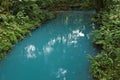 Sky-blue water in Rio Celeste in Parque Nacional Volcan Tenorio in Costa Rica