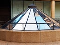 Sky and Building Reflections in Conical Glass Atrium Royalty Free Stock Photo