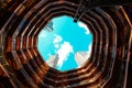 The sky and the buildings in a hole in Vessel in Hudson Yards