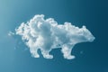 In the sky, a cloud resembling a bear shape floats effortlessly, A patch of clouds shaped like an animal, floating serenely by Royalty Free Stock Photo