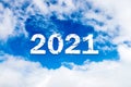 Sky cloud year 2021. Happy New year concept. 2021 cloud against the blue sky.Year 2021 symbol inscription on a background of blue Royalty Free Stock Photo