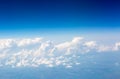The sky and clouds from the airplane porthole Royalty Free Stock Photo