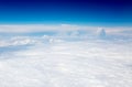 The sky and clouds from the airplane porthole Royalty Free Stock Photo