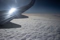 The sky and clouds from an airplane window. The beauty of the sky from high above, the airplane wing