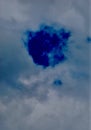 Detail of white clouds drawing the blue sky. Royalty Free Stock Photo