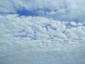 Sky with clouds. Meteorology, climate.Sky with clouds.White, fluffy clouds in blue sky.Sun rays and clouds.