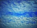 Sky with clouds. Meteorology, climate.Sky with clouds.White, fluffy clouds in blue sky.Sun rays and clouds.