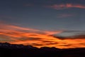 Sky clouds mountains sunset fiery Royalty Free Stock Photo