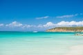 Sky with clouds over calm sea beach tropical resort. Boat touristic ship in turquoise ocean lagoon. Tourist attraction Royalty Free Stock Photo