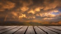 The Sky With Clouds And A Rainbow After The Rain with empty wooden table. Natural template landscape Royalty Free Stock Photo