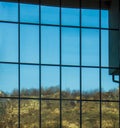 Sky and clouds reflected in windows of modern building Royalty Free Stock Photo