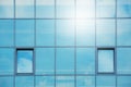 Sky and clouds reflected in the windows of a modern office building, glass building Royalty Free Stock Photo