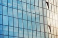 Sky and clouds reflected in the windows of a modern office building, glass building Royalty Free Stock Photo