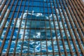 Sky clouds reflection in the skyscraper windows glass Royalty Free Stock Photo