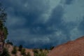 Sky clouds storm rocks sand traveler way tourism trees Royalty Free Stock Photo