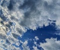 Sky in clouds and sun in clouds, hoops pesky and sky in small clouds Royalty Free Stock Photo