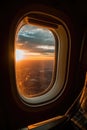 Sky with clouds and sunset seen through airplane window, created using generative ai technology